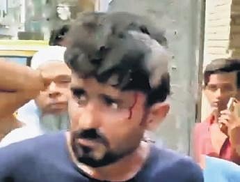 The alleged thief was partially shaven by the locals and was forced to clean the drains.