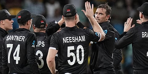 New Zealand's Tim Southee celebrates with teammates after he bowled out West Indies' Shamarh Brooks during the second ODI