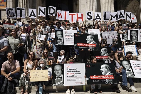 A group of writers and supporters gather in solidarity with Salman Rushdie outside the New York Public Library, on August 19, 2022. (Photo | AP)