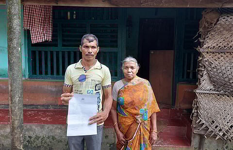 Vijay Gouda and his mother Gange in front of their house | Express