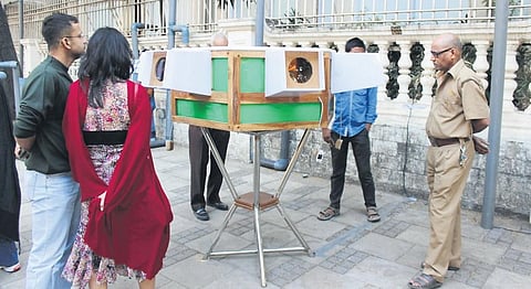 Visitors view the public installations of ‘Street Show’ in Mumbai in 2014