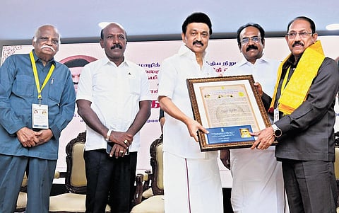 CM MK Stalin presenting Kalaignar Karunanidhi Semmozhi Tamil award to Dr M Rajendran at Central Institute of Classical Tamil in Chennai on Monday | Express