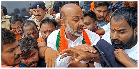 Telangana BJP President Bandi Sanjay Kumar being arrested by the police in Jangaon district on Tuesday, August 23. (Photo | PTI)