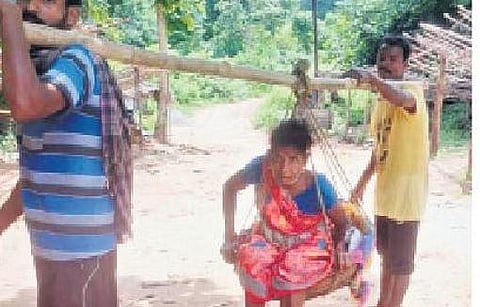 Sick tribal woman carried in doli for 15 km in Vizianagaram