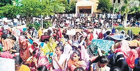 Students of IIIT-Basara stage protest in front of the administration office, here on Monday | Express photo