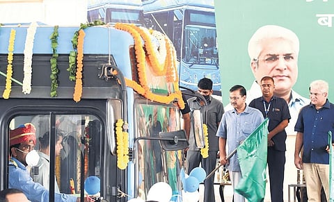 Arvind Kejriwal with Kailash Gahlot flags off a fleet of 97 electric buses at Rajghat Bus Depot on Wednesday | Parveen Negi