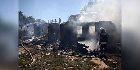 Ukrainian firefighters put out the fire in a destroyed house following a Russian shelling in the town of Bakhmut, Donetsk region on August 24, 2022 (Photo | AFP)