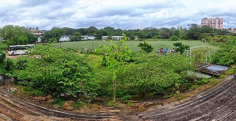 Overgrown grass has taken over the premises of Ambedkar Stadium, once a beehive of sporting activities, especially football. (Photo |  A Sanesh)