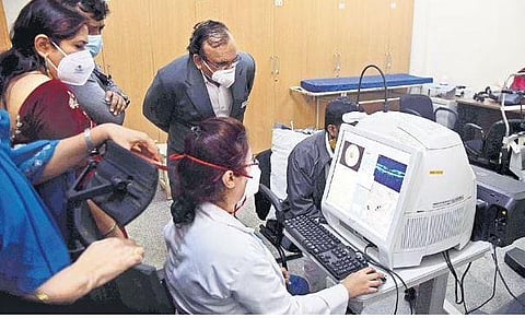 A team of Karnataka Lokayukta, comprising judicial and police officers, inspects equipment at Minto Eye Hospital in the city on Wednesday | Vinod Kumar T