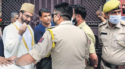 Mirwaiz Umar Farooq tries to leave his house in Srinagar on Friday. (Photo | Zahoor Punjabi/EPS)