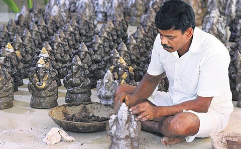 An inmate makes Vinayakar idols at Madurai Central Prison | K K Sundar