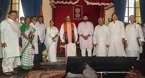 Nine MLAs were administered the oath as Cabinet Ministers by West Bengal Governor La Ganesan in the presence of West Bengal Chief Minister and TMC chief Mamata Banerjee, in Kolkata. (Photo | PTI)