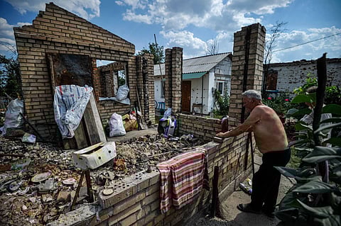 Vasily 68, looks at his destroyed house in the village of Andriivka, Kyiv region, on August 29, 2022, amid Russia's invasion of Ukraine. (Photo | AFP)