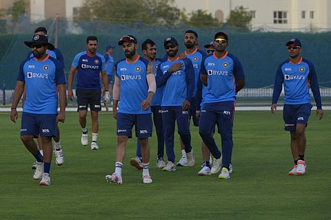 India's captain Rohit Sharma, left, and teammates arrive to participate in a training session at ICC ground. (File Photo | AP)
