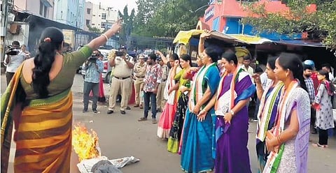 Congress activists stage a protest near the District Health & Medical Office in Hyderabad on Tuesday