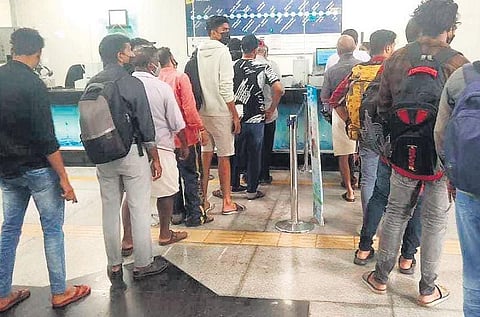 The long queue at Kaloor Metro station ticket counter