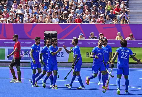 Indian players celebrate a goal against Canada during the Men's Pool B hockey match at the Commonwealth Games in Birmingham. (Photo | AP)
