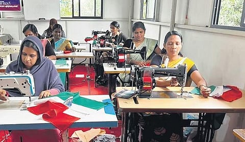 Kudumbashree members in Malappuram engaged in making national flags as part of ‘Har Ghar Tiranga’ campaign | Express