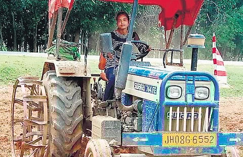 Manju Oraon in her tractor. (Photo | PTI)