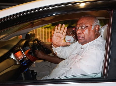 Senior Congress leader Mallikarjun Kharge leaves Young Indian (YI) office, the holding company of Congress-owned newspaper National Herald. (Photo | PTI)
