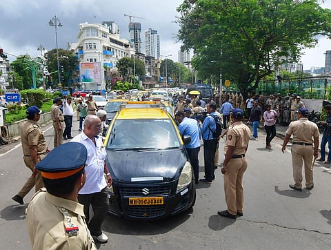 Police personnel check vehicles as security is increased amid nationwide protests by Congress, in Mumbai, on August 5, 2022. (Photo | PTI)