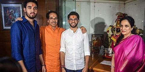 Shiv Sena leader Aditya Thackeray with his brother Tejas Thackeray (L), father Uddhav Thackery (second left) and mother Rashmi Thackeray (R) after winning the assembly elections at Sena Bhavan in Mumb
