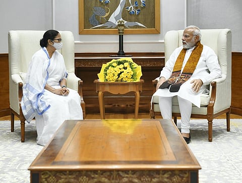 Prime Minister Narendra Modi with West Bengal CM Mamata Banerjee during a meeting in New Delhi.  (Photo | PTI)