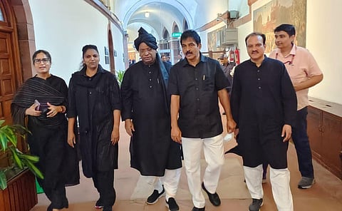 Congress MPs in Parliament wear black clothes in protest against inflation and unemployment on Friday. (Photo | Twitter/ANI)