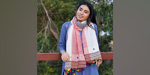 A model displaying handwoven kutch Cotton stole. (Photo | iTokri @ Instagram)