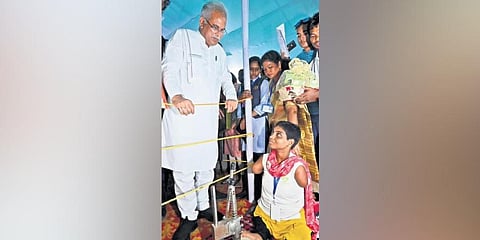 A beneficiary of Mukhyamantri Kausal Vikas Yojana with CM Bhupesh Baghel; (top right) tribal youths working in a factory manufacturing LED bulbs | Express