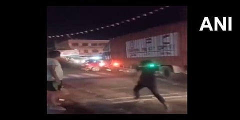 Samajwadi Party (SP) leader Devendra Singh Yadav's car was hit by a truck and was dragged for more than 500 meters in Uttar Pradesh's Mainpuri district. (ANI Twitter video screengrab)