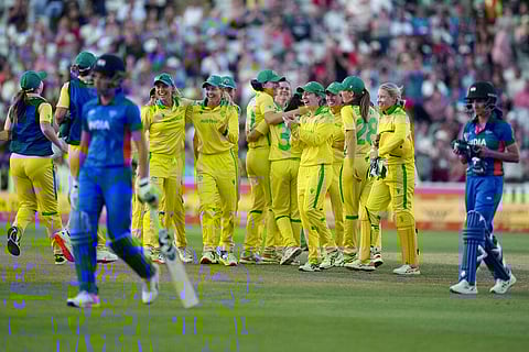 Australian players celebrate their win in the women's cricket T20 final match against India at Edgbaston at the Commonwealth Games in Birmingham. (Photo | AP)