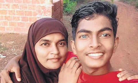 Maimoona with her son Ibrahim Badusha who is an endosulfan victim.