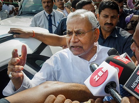 Janata Dal (United) leader Nitish Kumar interacts with the media after submitting his resignation to Bihar Governor Phagu Chauhan, outside Raj Bhavan in Patna. (Photo | PTI)
