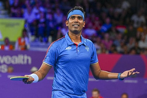 Sharath Kamal Achanta of India reacts after defeating Liam Pitchford of England in the men's singles table tennis gold medal match at the Commonwealth Games. (Photo | AP)