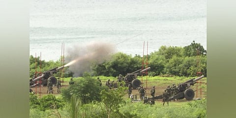 Taiwan's military conducts artillery live-fire drills at Fangshan township in Pingtung, southern Taiwan. (Photo | AP)