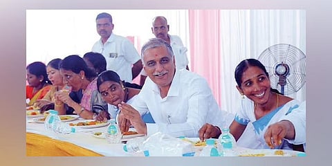 Minister Harish Rao with ASHA and ANM workers in Vikarabad on Friday