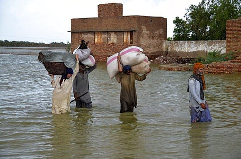 Hindu temple provides food and shelter to hundreds of flood-hit people in Pakistan