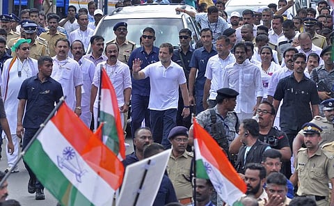 Former Congress president Rahul Gandhi waved at the crowd when his Bharat Jodo Yatra entered the Kerala border at Parassala on Sunday. (Photo | EPS)