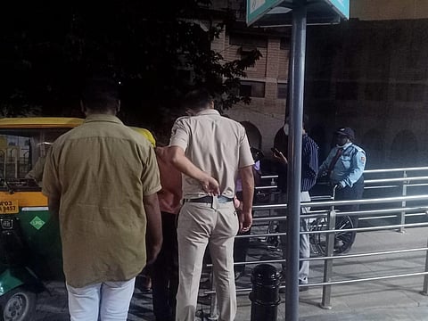 A woman collapsed inside Cubbon Park metro station. In the picture, she is being brought by wheel chair before she was rushed to Fortis Hospital.