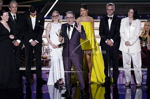 John Oliver and team from 'Last Week Tonight with John Oliver' accepts the Emmy for outstanding variety talk series
