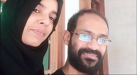 Siddique Kappan with his wife Raihanath Kappan. (Photo | PTI)