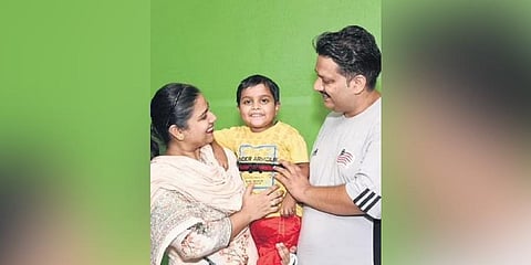 The 5-year-old child who received the kidneys with his parents.(Photo | Express)