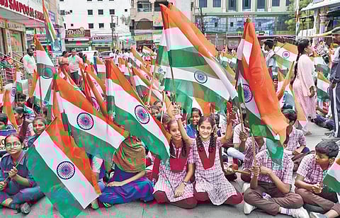 Schoolchildren participate in the dress rehearsal for the Telangana Jateeya Samaikhya Vajrostvalu at Ameerpet  in Hyderabad on Friday | Jwala