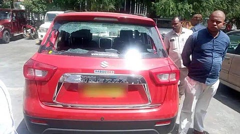 A picture of TRS leader Gosula Srinivas Yadav's car which was vandalised after it allegedly blocked Home Minister Amit Shah's convoy in Hyderabad. (Photo | Twitter)