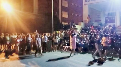Students of the Chandigarh University protest on the campus after private videos of several women students were posted on social media, in Mohali, Saturday night, Sept. 17, 2022. (Photo | PTI)