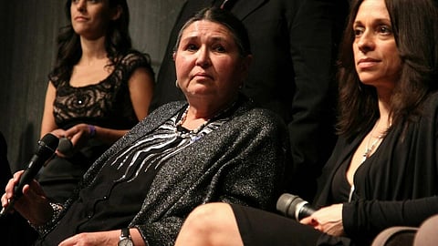 Sacheen Littlefeather (L), who is Apache and Yauqui, was heckled at the 1973 Academy Awards while explaining why an absent Brando could not accept his best actor Oscar. (Photo | AFP)