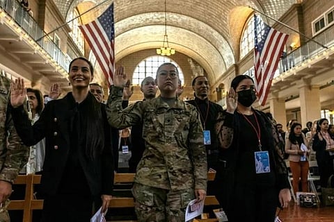'I belong here': New US citizens take oath on Ellis Island. (Photo | AFP)