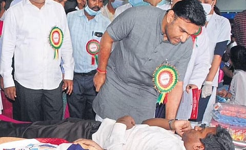 Health Minister K Sudhakar and MP PC Mohan at a blood camp in Bengaluru | Express