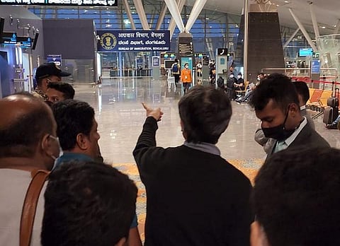 Passengers of Thai Airways at KIA, Bengaluru as their flight returned after take-off. (Photo | EPS)